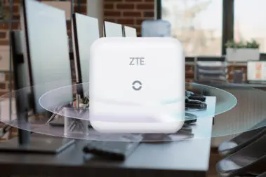 Nobody in empty call center workstation with computers