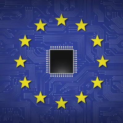 Flaga UE na tle płytki drukowanej - w środku znajduje się procesor