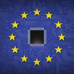 Flaga UE na tle płytki drukowanej - w środku znajduje się procesor